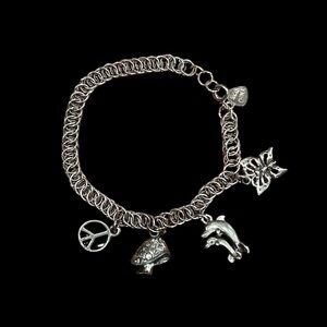 Sterling Silver Charm Bracelet with Peace and Dolphin Charms